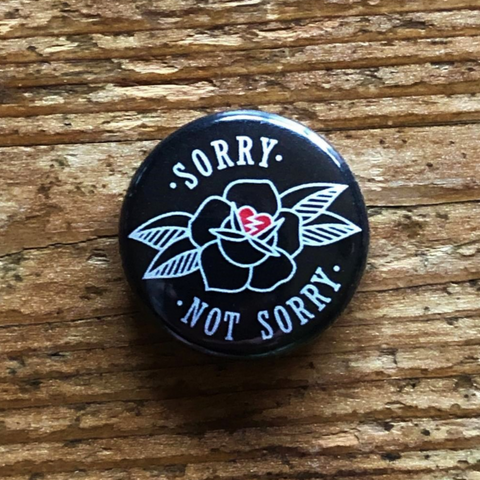 SORRY NOT SORRY badge